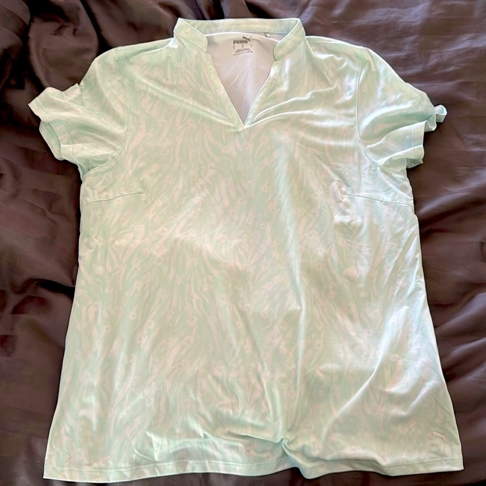 NWOT Puma golf shirt. Never worn.